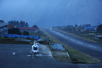 High angle view of city street against sky