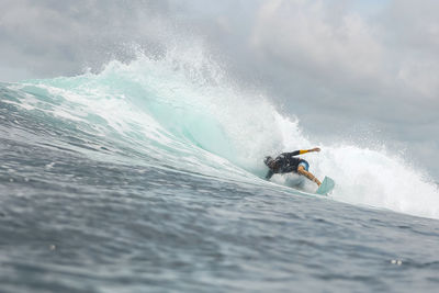 Surfer on a wave