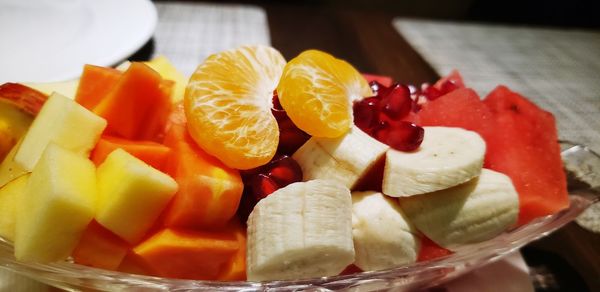 Close-up of chopped fruits in plate