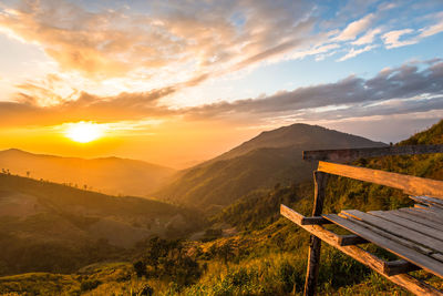 Scenic view of landscape against sky during sunset