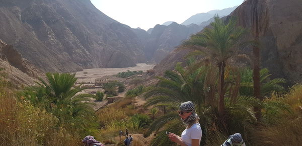 High angle view of people on mountain road