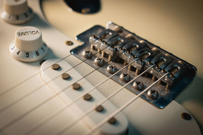 High angle view of guitar on table