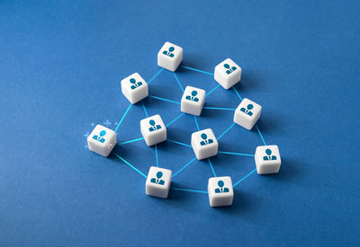 High angle view of toy blocks on blue background