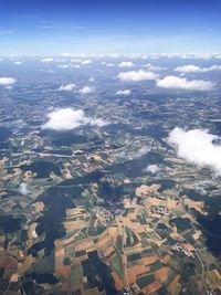 Aerial view of agricultural field against sky