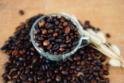 Close-up of coffee beans on table