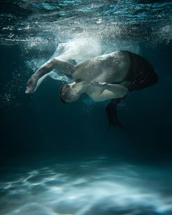 Man swimming in sea