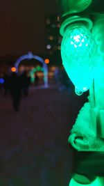 Man with illuminated lighting equipment