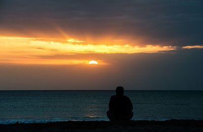 Scenic view of sea at sunset