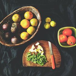 High angle view of fresh food on black fabric