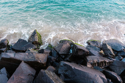 High angle view of rocks on beach