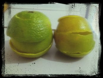 Close-up of lemon slice on table