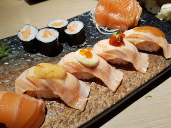 Close-up of sushi served on table