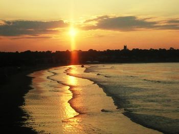 Scenic view of sunset over river