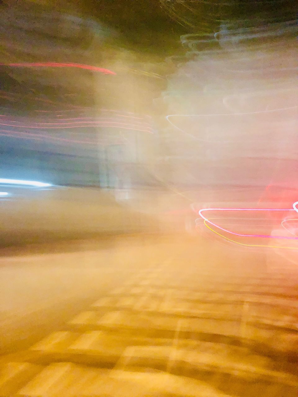 AERIAL VIEW OF LIGHT TRAILS ON ROAD