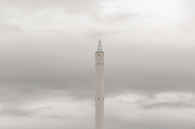 Low angle view of fallturm bremen against cloudy sky