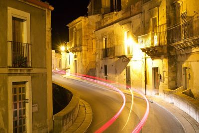 Light trails on city street at night
