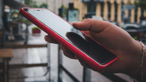 Close-up of person using mobile phone