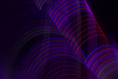 Close-up of light trails against black background