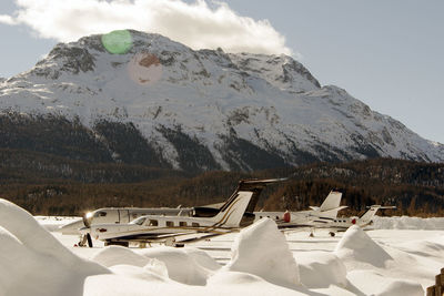 Private jets and aircrafts in the airport of engadine st moritz in winter time