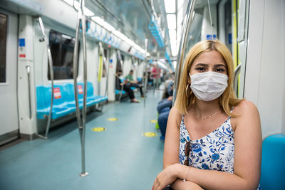Portrait of woman in train