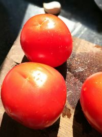 High angle view of red tomatoes on table