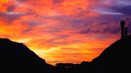 Low angle view of dramatic sky during sunset