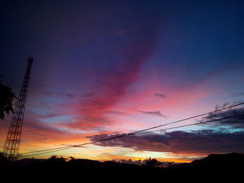 Low angle view of dramatic sky during sunset