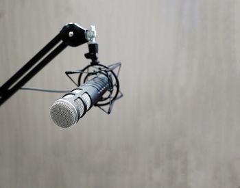 Close-up of chain against wall