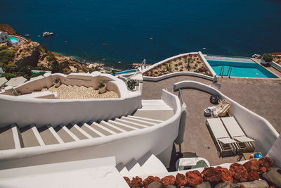 High angle view of steps by sea at santorini
