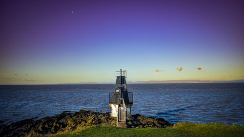 View o lighthouse at seashore