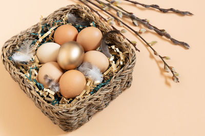 High angle view of eggs in basket