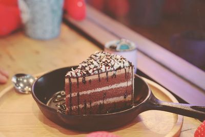 Close-up of chocolate cake on table