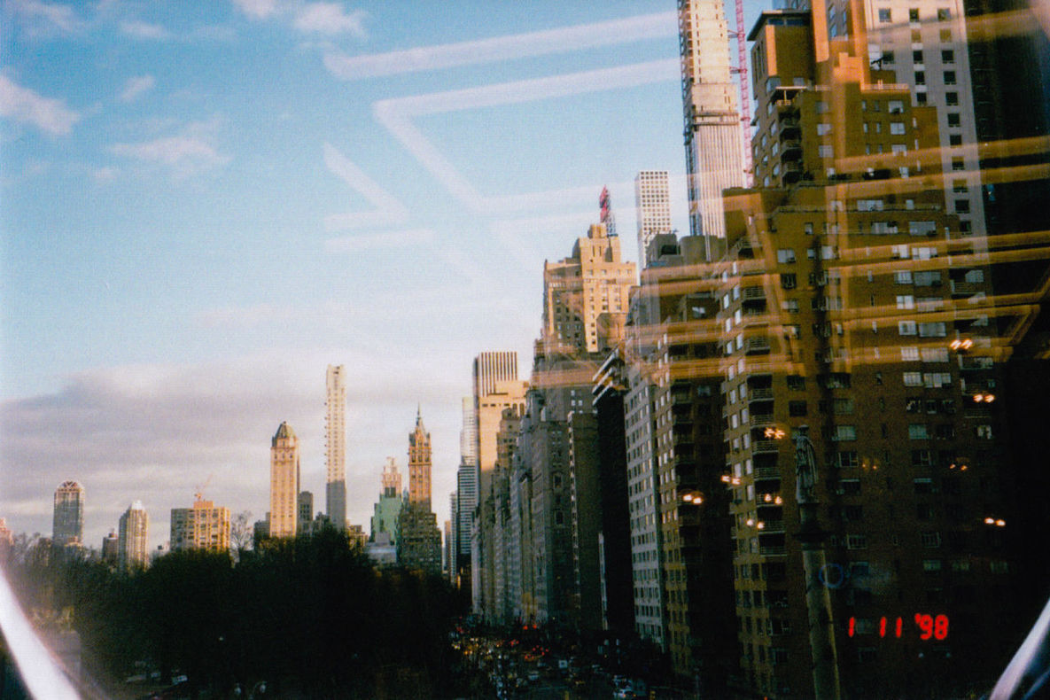 PANORAMIC VIEW OF BUILDINGS AGAINST SKY