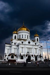 Low angle view of cathedral against cloudy sky