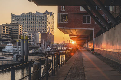 Germany, hamburg, sandtorhafen and elbphilarmonie at sunset