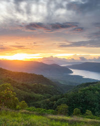 Scenic view of landscape against sky during sunset