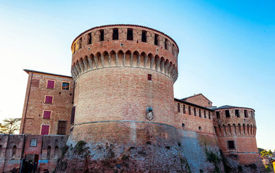 Low angle view of historical building against clear sky