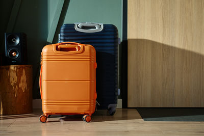 Suitcase on hardwood floor at home