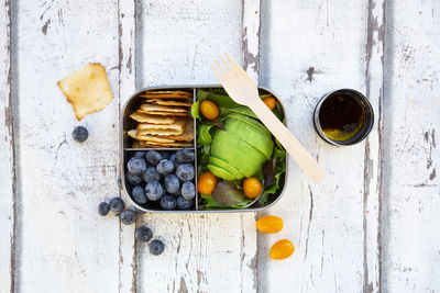 High angle view of fruits in container on table