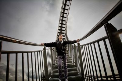 Full length of teenage boy standing at tiger and turtle  magic mountain