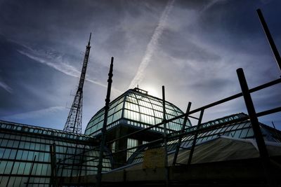 Low angle view of construction site against sky