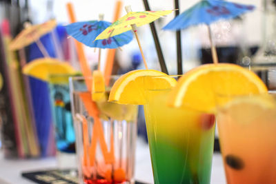 Close-up of multi colored drinks