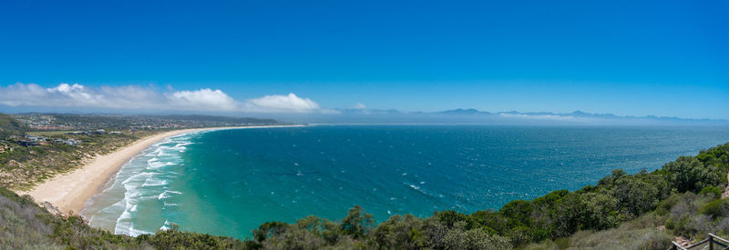 Epic panorama landscape with ocean beach and seaside town. plettenberg bay, south africa