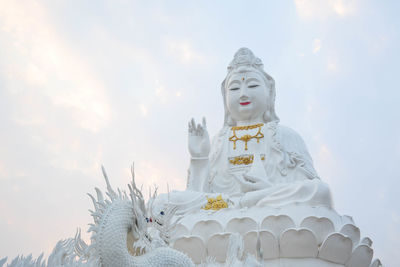 A statue of guanyin,guanyin is the buddhist bodhisattva associated with compassion