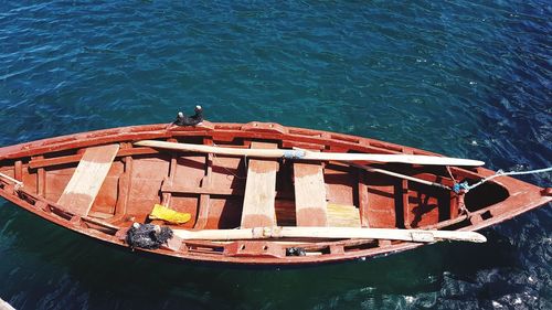 High angle view of boat sailing in sea