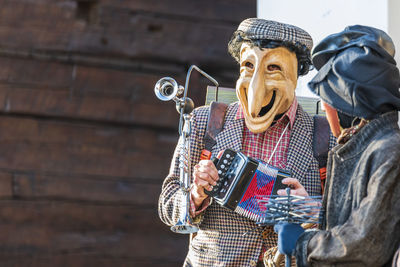 Carnival in carnia. sauris, masks of the religious and pagan tradition. italy