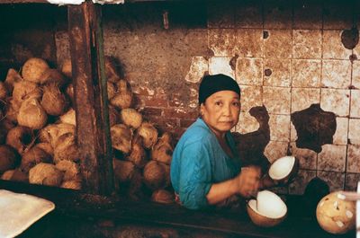 Portrait of man preparing food