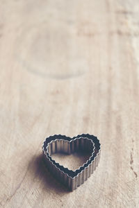 Close-up of heart shape on table