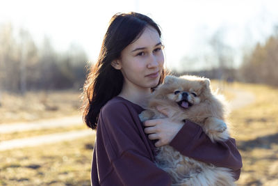 Young woman with dog