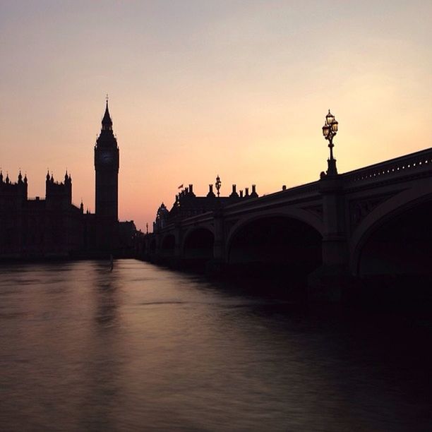 architecture, built structure, building exterior, famous place, sunset, international landmark, travel destinations, tourism, capital cities, city, travel, river, tower, clear sky, sky, connection, waterfront, bridge - man made structure, spire, big ben